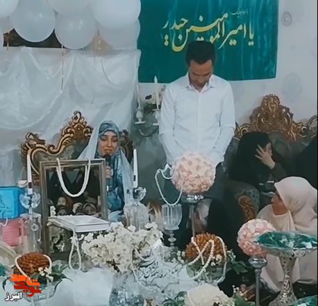 فیلم| برگزاری مراسم ازدواج شهدایی با حضور خانواده شهید عجمیان