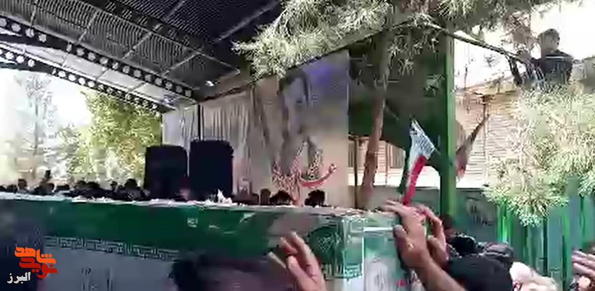 کلیپ| خاکسپاری پیکر شهید مهندس «سیدامیرحسین خادمی» در میدان گلزار شهدای نظرآباد